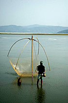 local fisherman on the Brahamaputra river